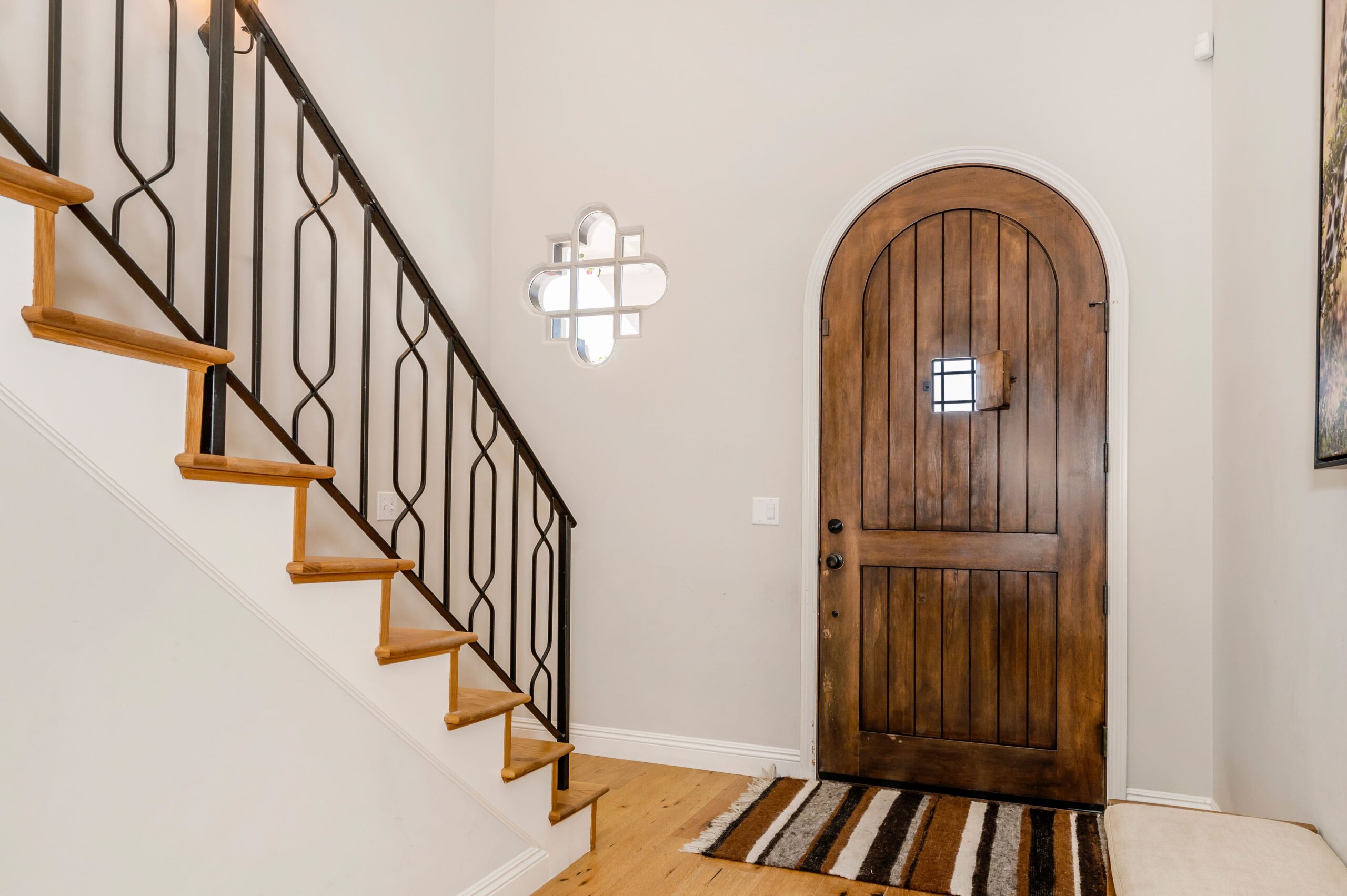 Traditional arched door reimagined in slim aluminium frame