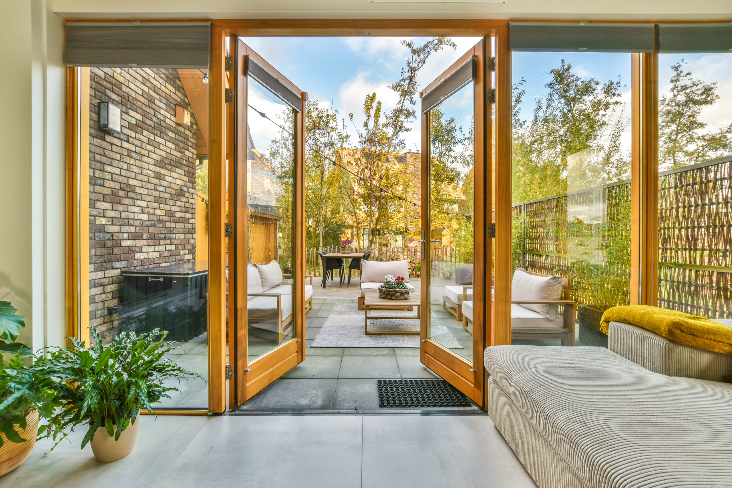 Minimalist folding glass doors for seamless transitions