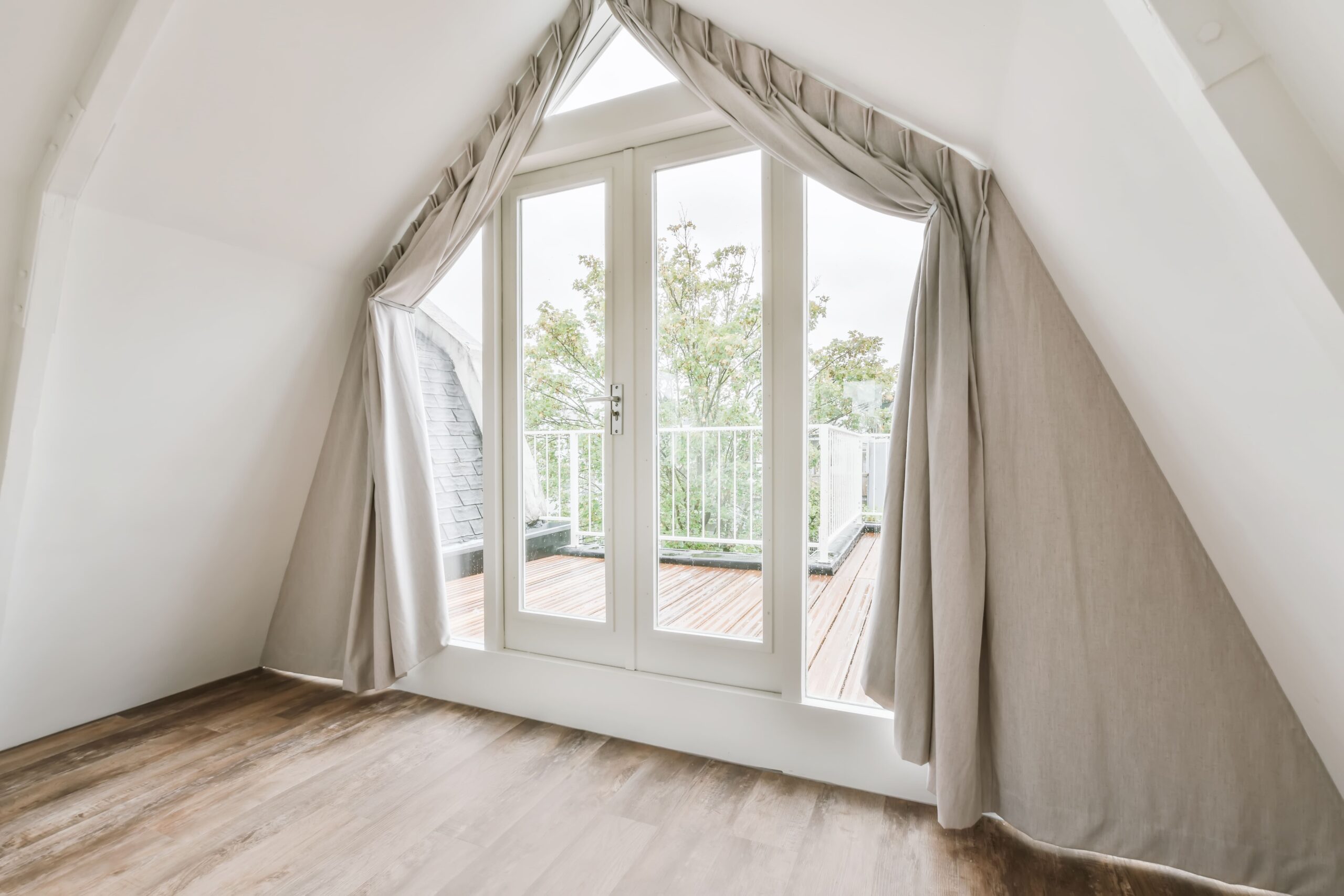 Custom gable windows bringing light to vaulted ceilings