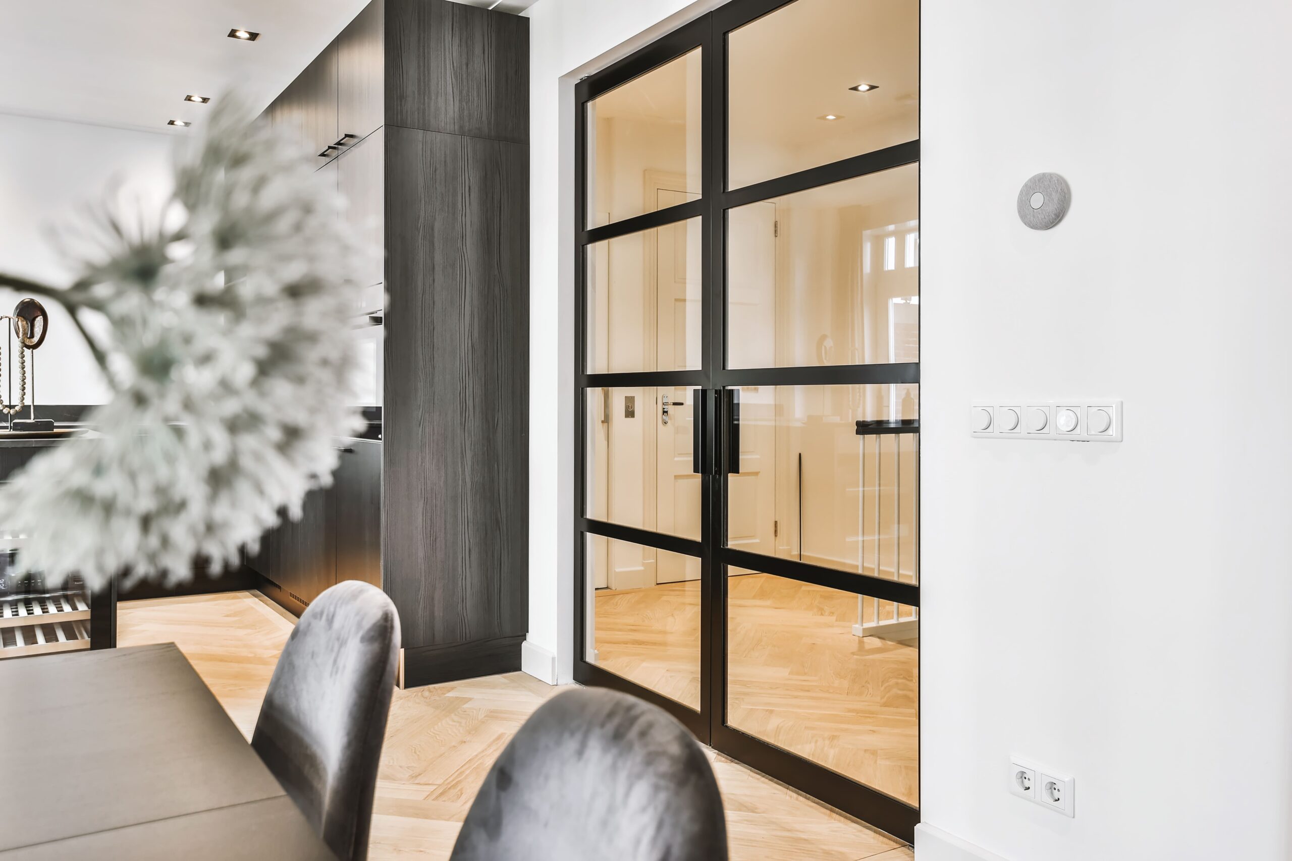 Stylish pivot doors combining security and natural light